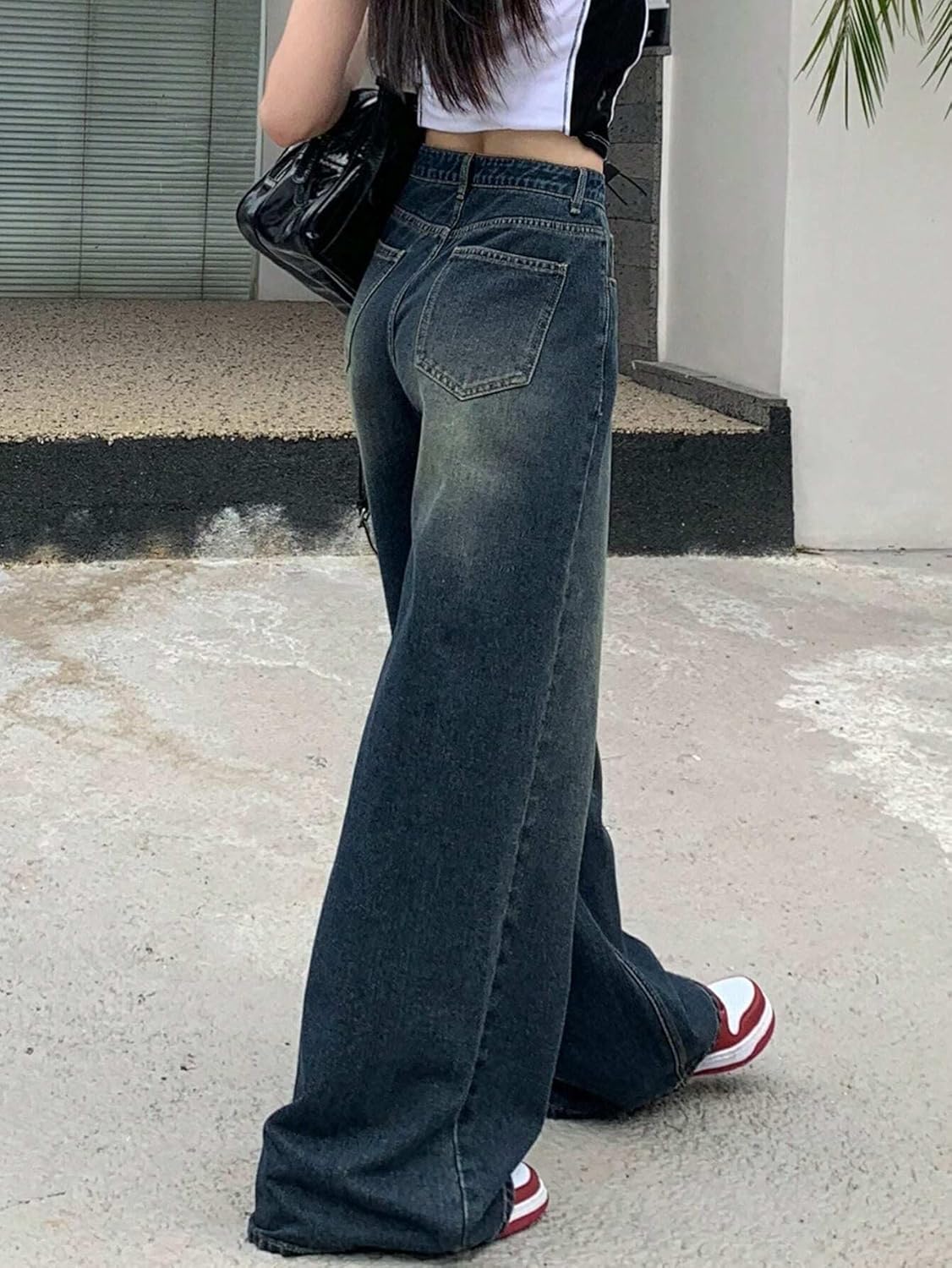 High-Waisted Baggy Denim with Utility Pockets for Women. Casual Wide-Leg Trousers.